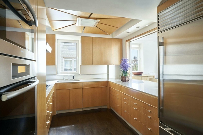 The kitchen in an apartment designed by Gillis Architects at 930 Fifth Ave