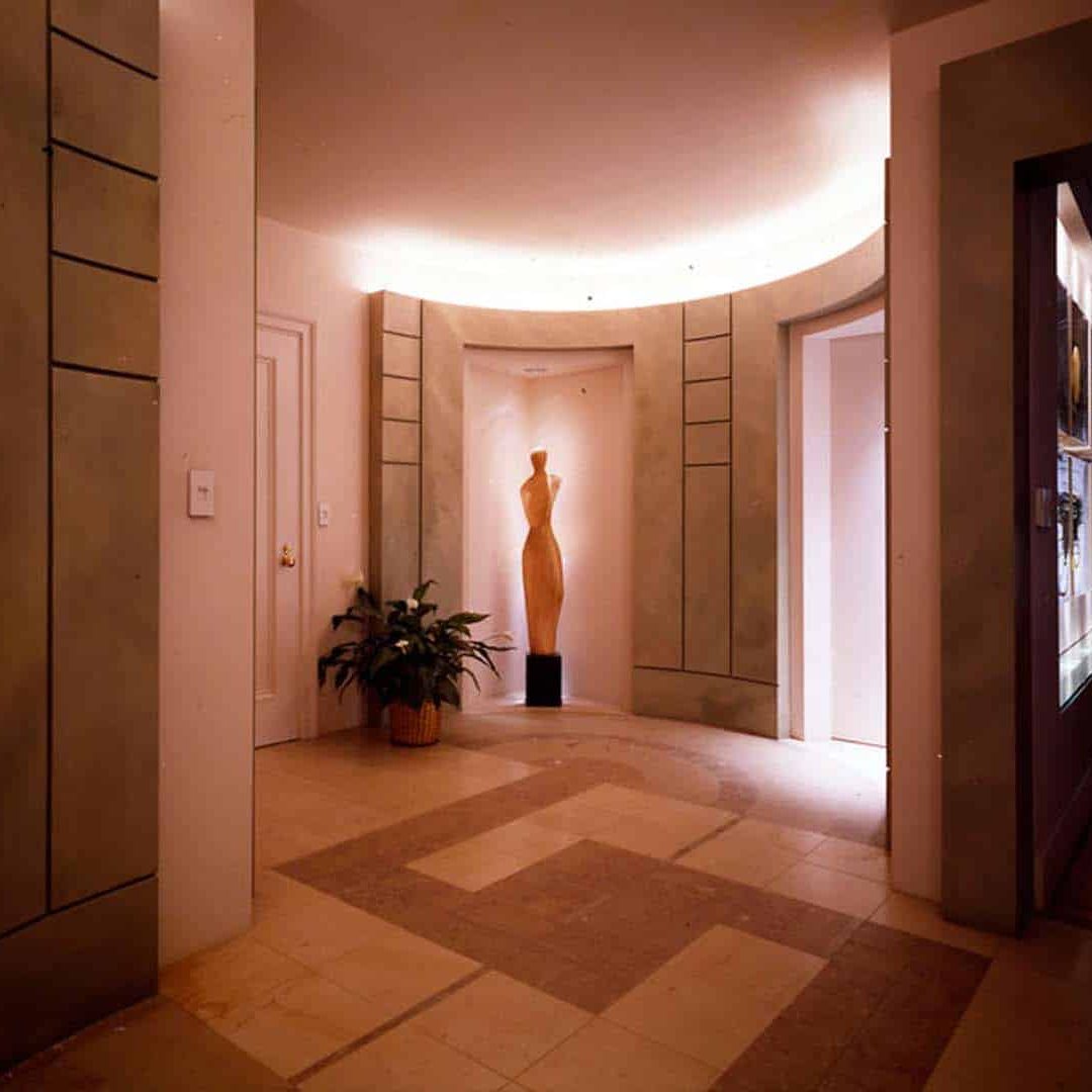Modern statue with plant semicircle room